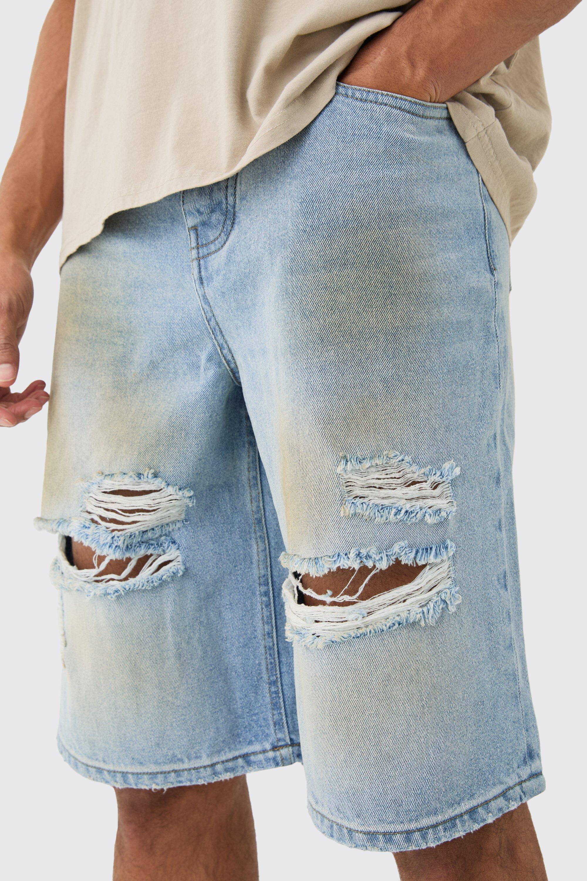 Ripped Dirty Wash Denim Jorts In Light Blue boohoo CA